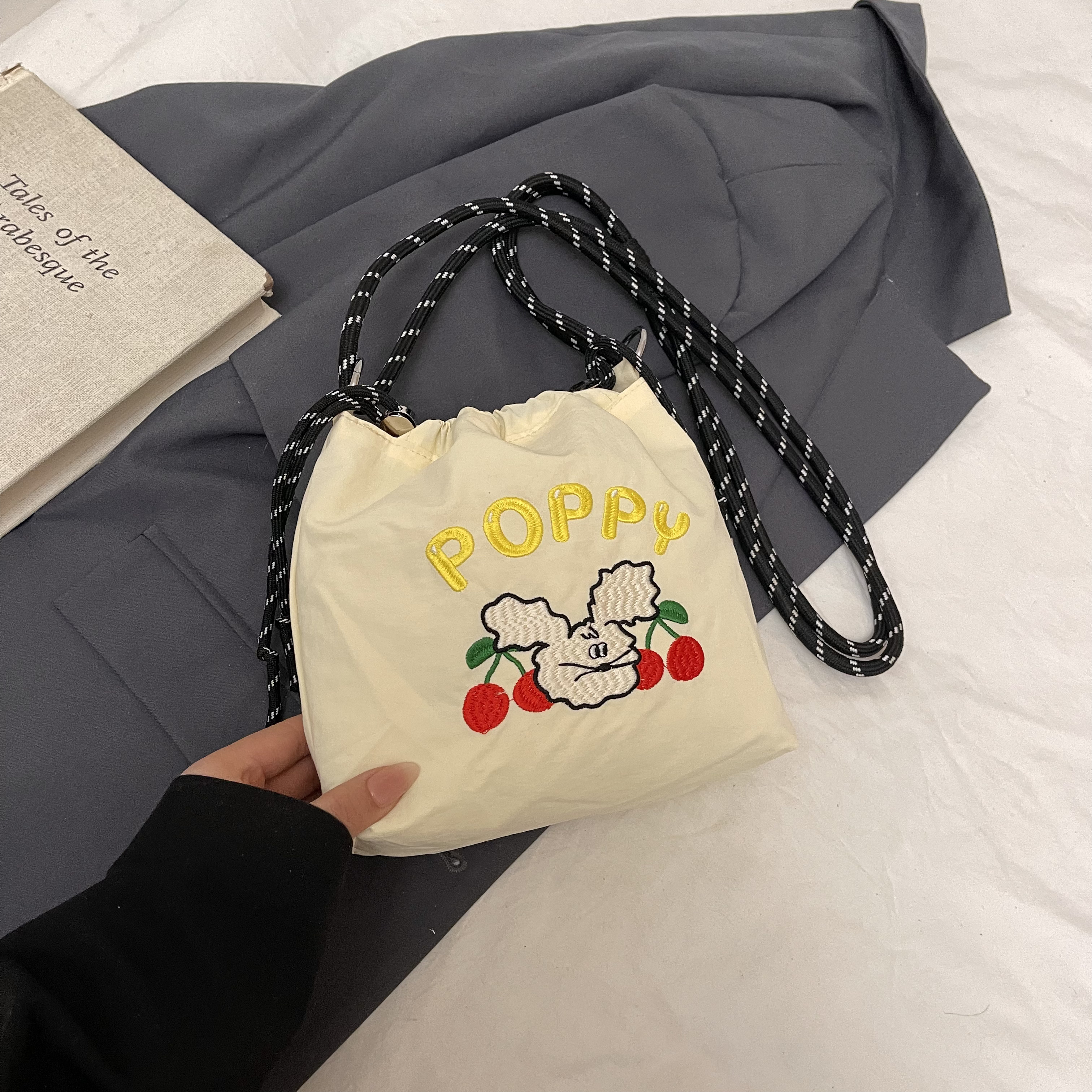 2025 Women's Summer Nylon Embroidered Canvas Drawstring Crossbody Bag - Simple Portable Phone Bag