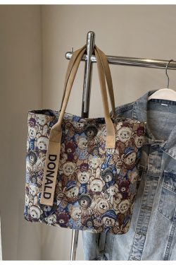 Women’s Niche Cartoon Canvas Tote Bag – Large Capacity Spring 2025 Commuter Shoulder Bag for Students