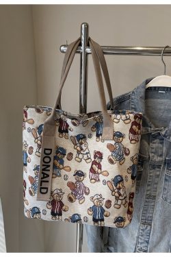 Women’s Niche Cartoon Canvas Tote Bag – Large Capacity Spring 2025 Commuter Shoulder Bag for Students