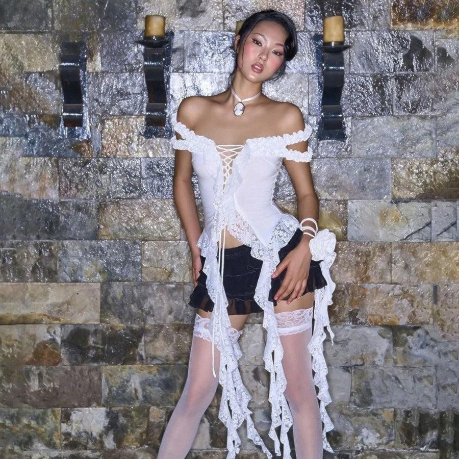 Lace Ruffled Top: Discover the Best Belly Button Piercing Places