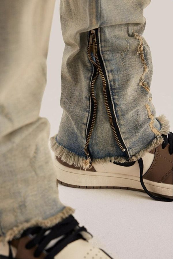 Slim Leg Ripped Jeans