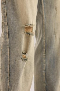 Slim Leg Ripped Jeans